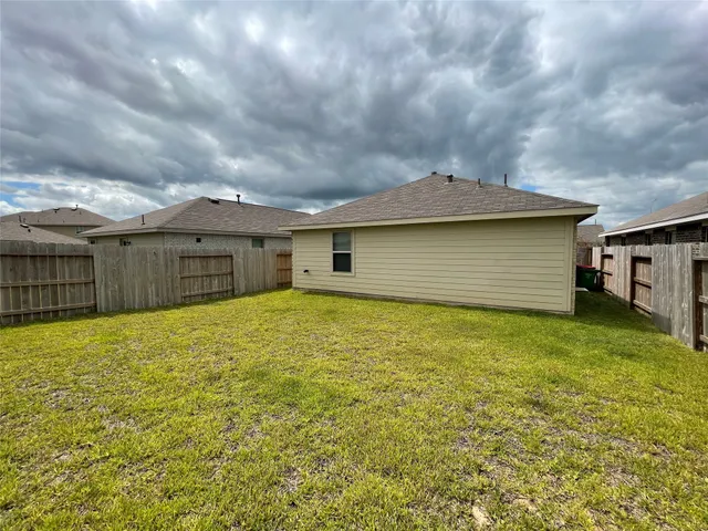 a view of a backyard with a garden