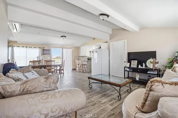 a living room with furniture and a table