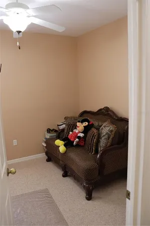 a bedroom with a bed and a cabinets