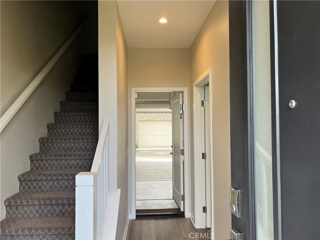 2336 Synergy Irvine, CA 92614 - Photo 24 of 24 a view of a hallway with a white door