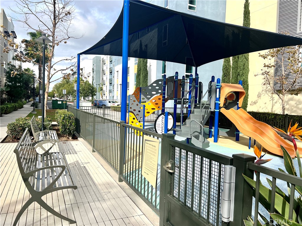 2336 Synergy Irvine, CA 92614 - Photo 5 of 24 a view of a patio with a table chairs and backyard