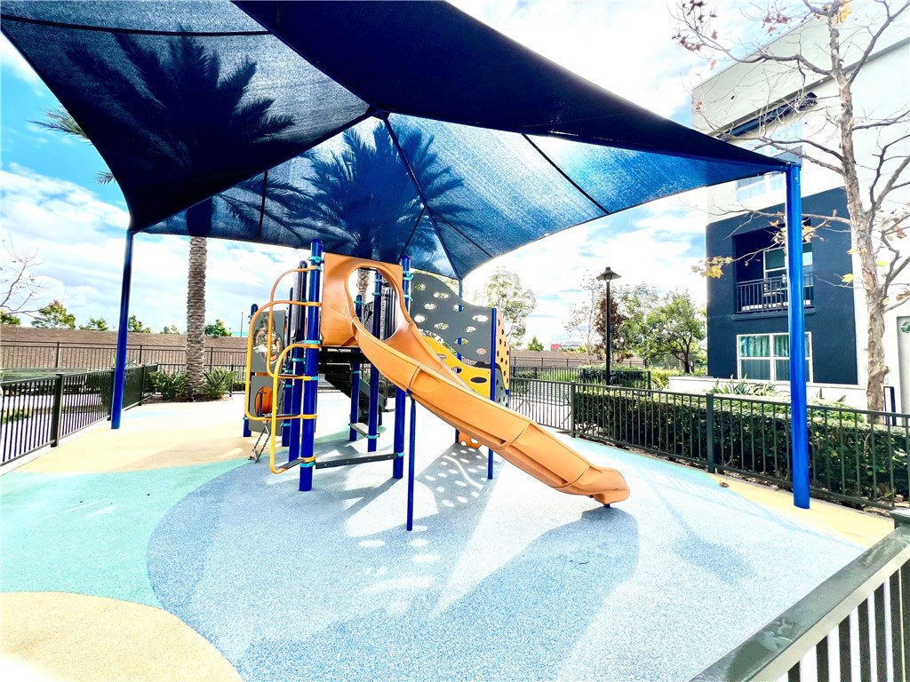 2336 Synergy Irvine, CA 92614 - Photo 6 of 24 a view of a swimming pool with a porch and furniture