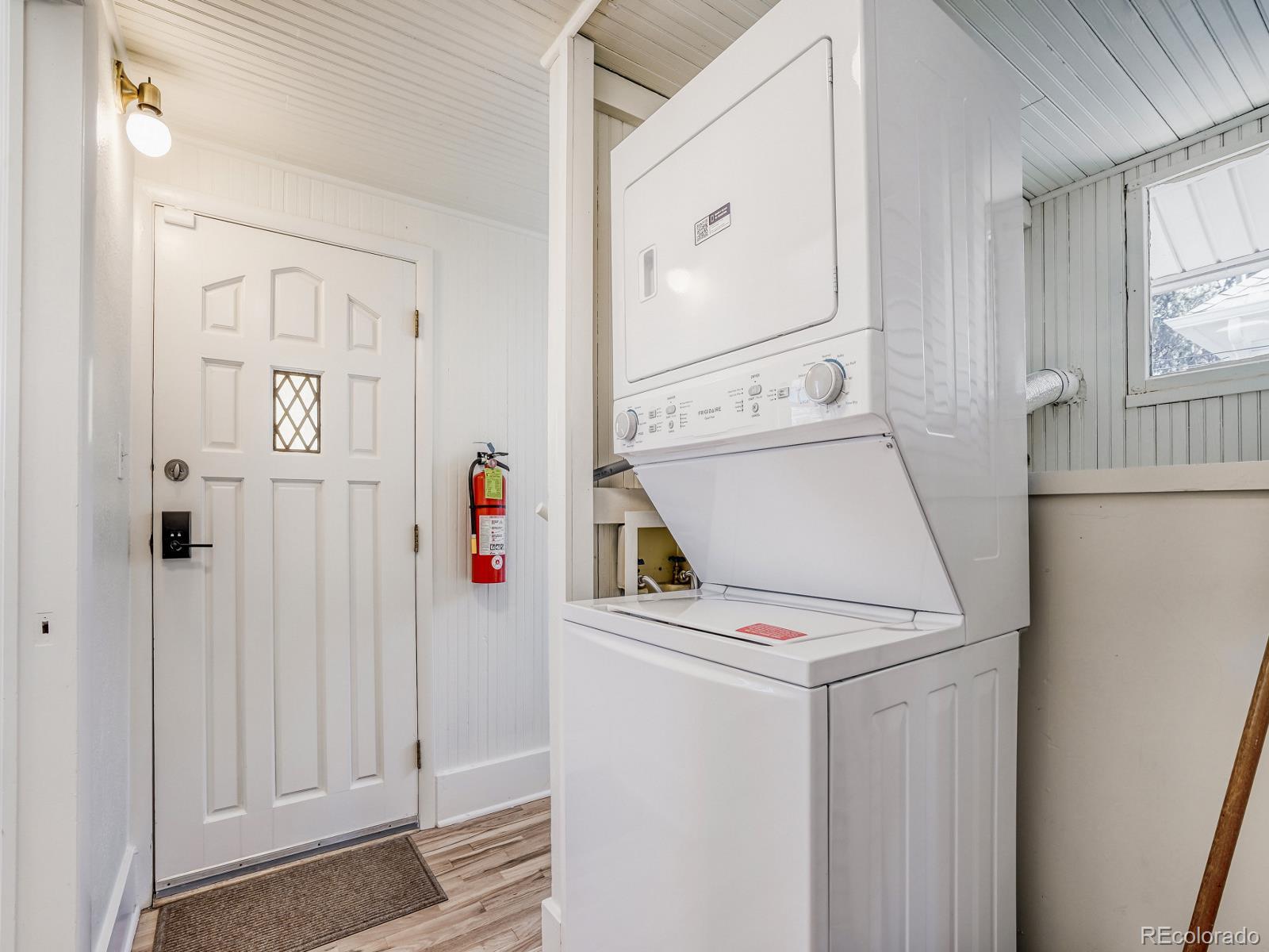 7607 Ralston Road Arvada, CO 80002 - Photo 20 of 28 a utility room with dryer and washer