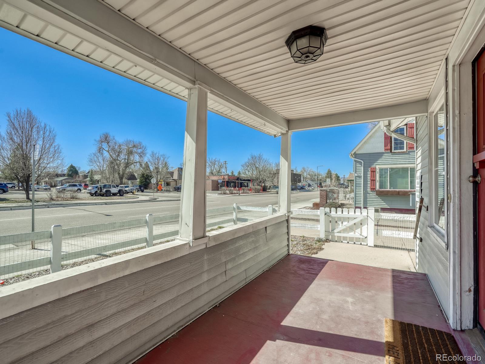 7607 Ralston Road Arvada, CO 80002 - Photo 25 of 28 a view of a balcony with city view