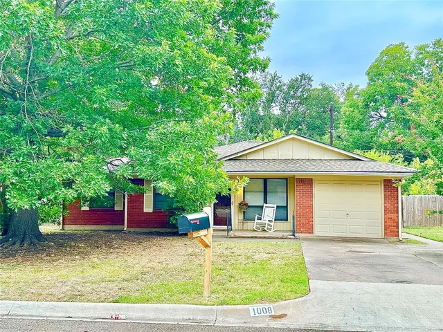 a house view with a outdoor space