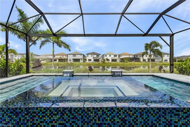 a view of a patio with a table and chairs