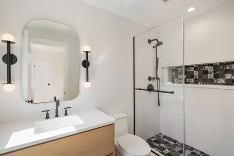a bathroom with a sink and toilet