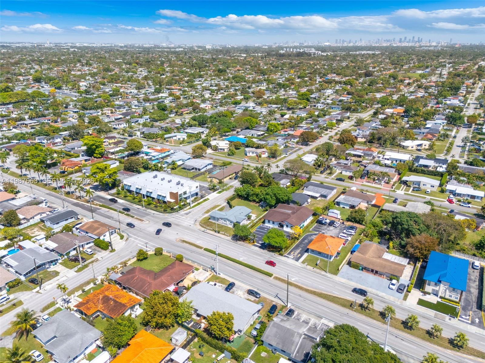 3630 Southwest 87th Avenue Miami, FL 33165 - Photo 2 of 14 an aerial view of residential houses with outdoor space