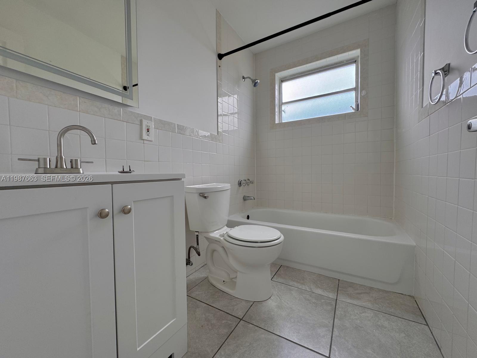 3630 Southwest 87th Avenue Miami, FL 33165 - Photo 6 of 14 a bathroom with a toilet sink and bathtub