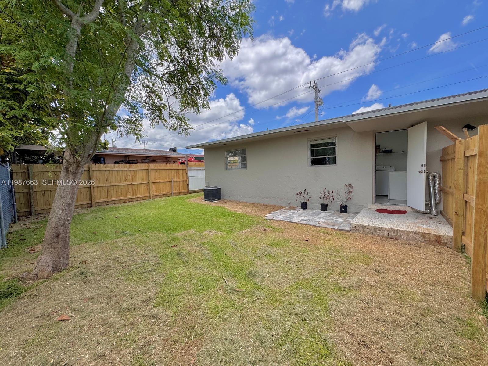 3630 Southwest 87th Avenue Miami, FL 33165 - Photo 10 of 14 a front view of house with yard