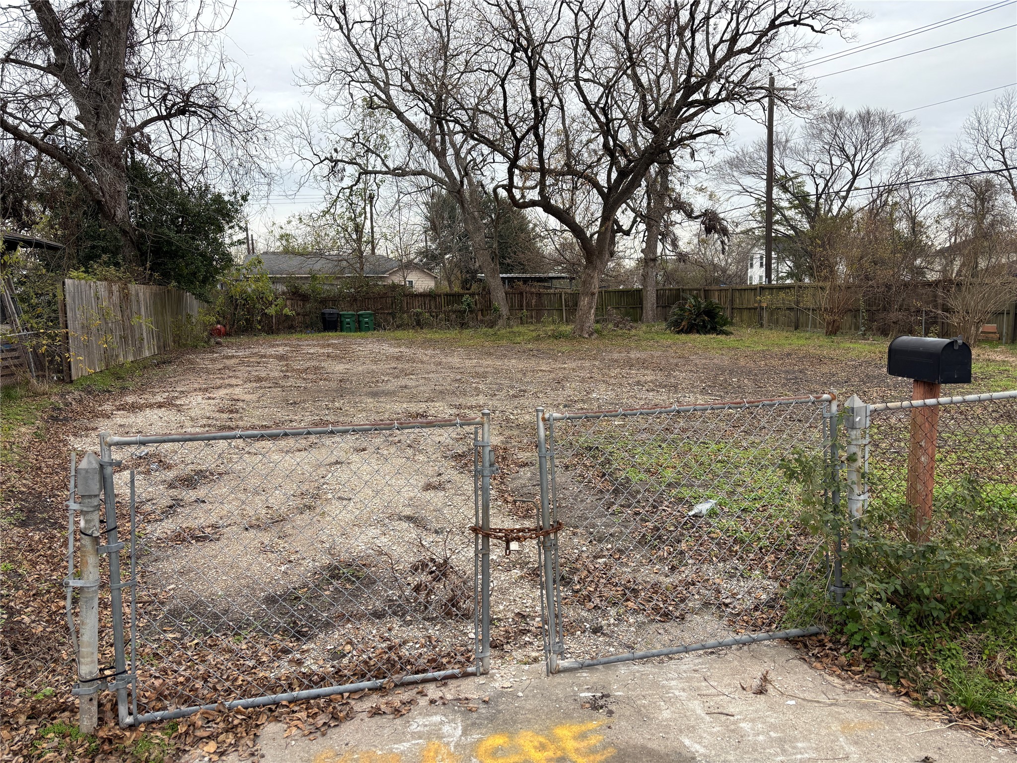 4028 Cornell Street Houston, TX 77022 - Photo 2 of 6 a backyard of a house with trees