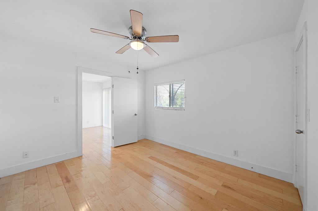 1313 East 52nd Street, Unit 105 Austin, TX 78723 - Photo 9 of 16 a view of an empty room with a window