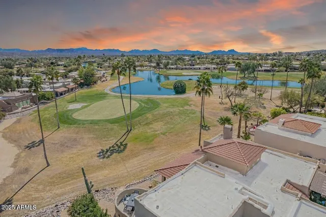 a view of an outdoor dining space with furniture