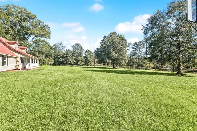 $375,000 | 26211 Highway 190, Robert, LA 70455