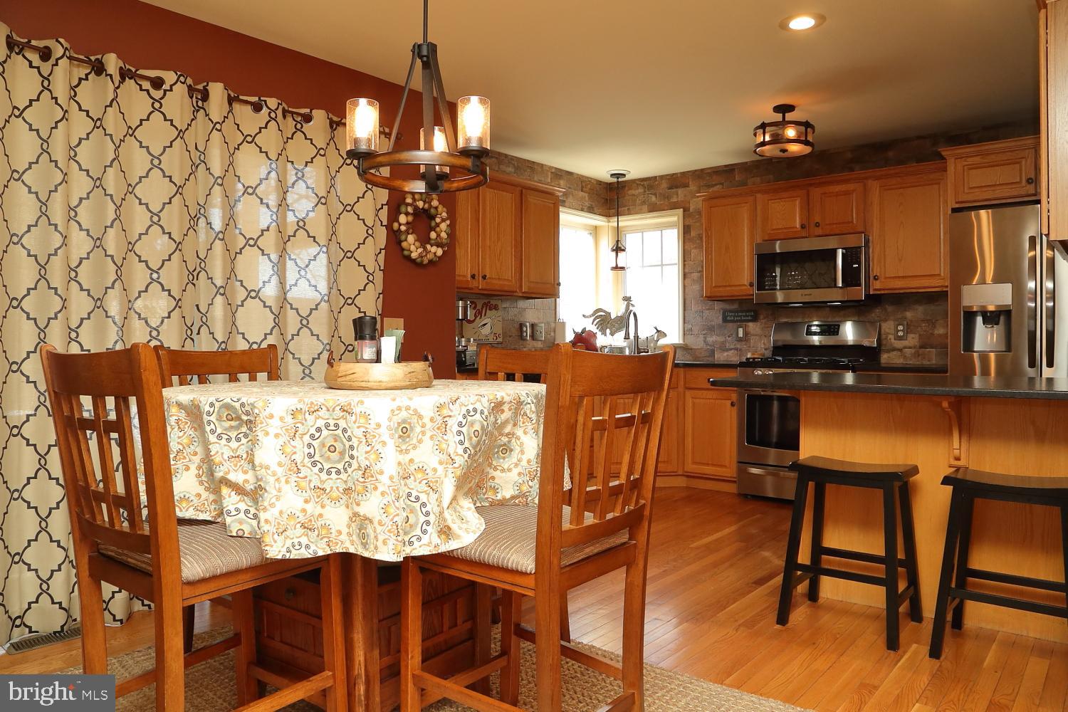 114 Saybrooke Drive Lititz, PA 17543 - Photo 14 of 34 Breakfast area to kitchen and slider to patio