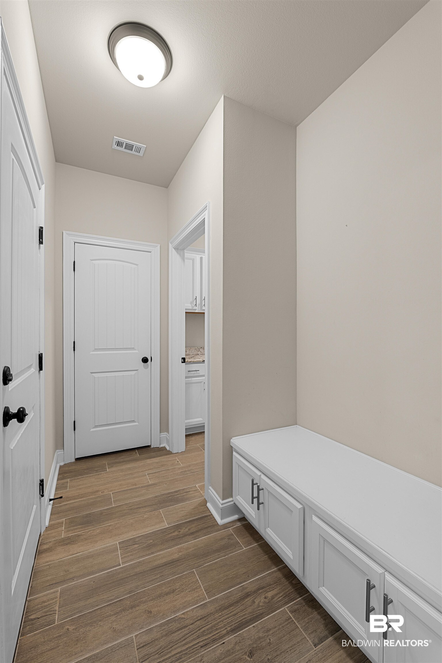 991 Dalton Circle Foley, AL 36535 - Photo 24 of 35 Mudroom with dark wood-type flooring