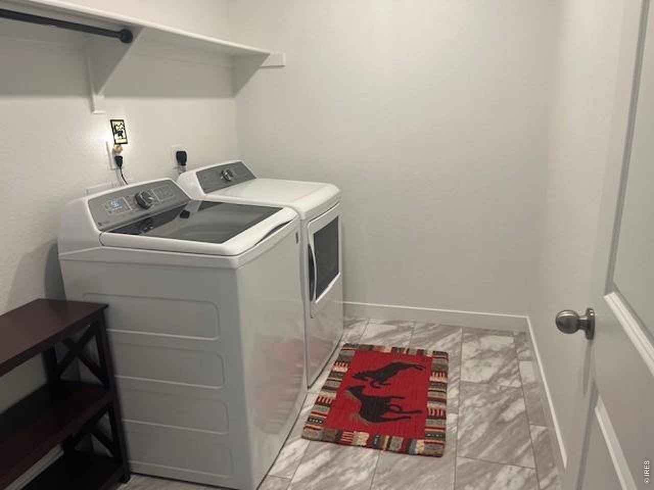 1981 Miranda Road Erie, CO 80516 - Photo 32 of 42 Upstairs Laundry Room-Washer and Dryer Included