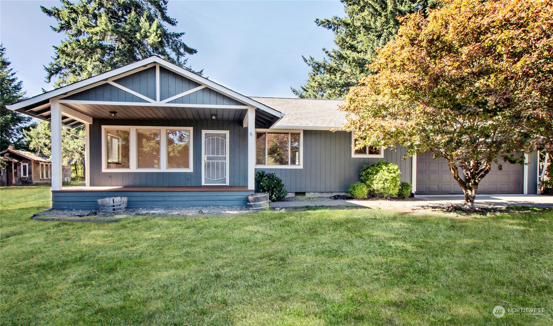 16635 Case Road Southwest Rochester, WA 98579 - Photo 1 of 35 a front view of a house with a yard