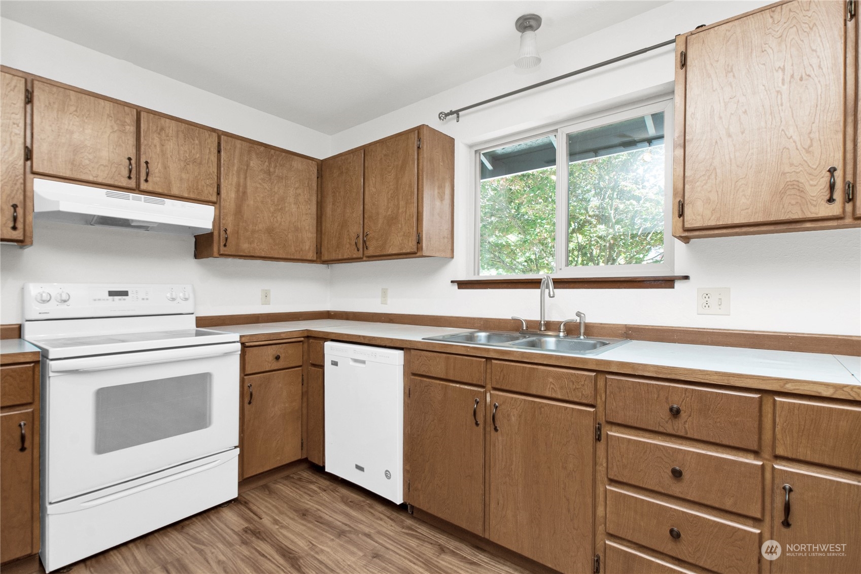 16635 Case Road Southwest Rochester, WA 98579 - Photo 12 of 35 a kitchen with sink cabinets and window