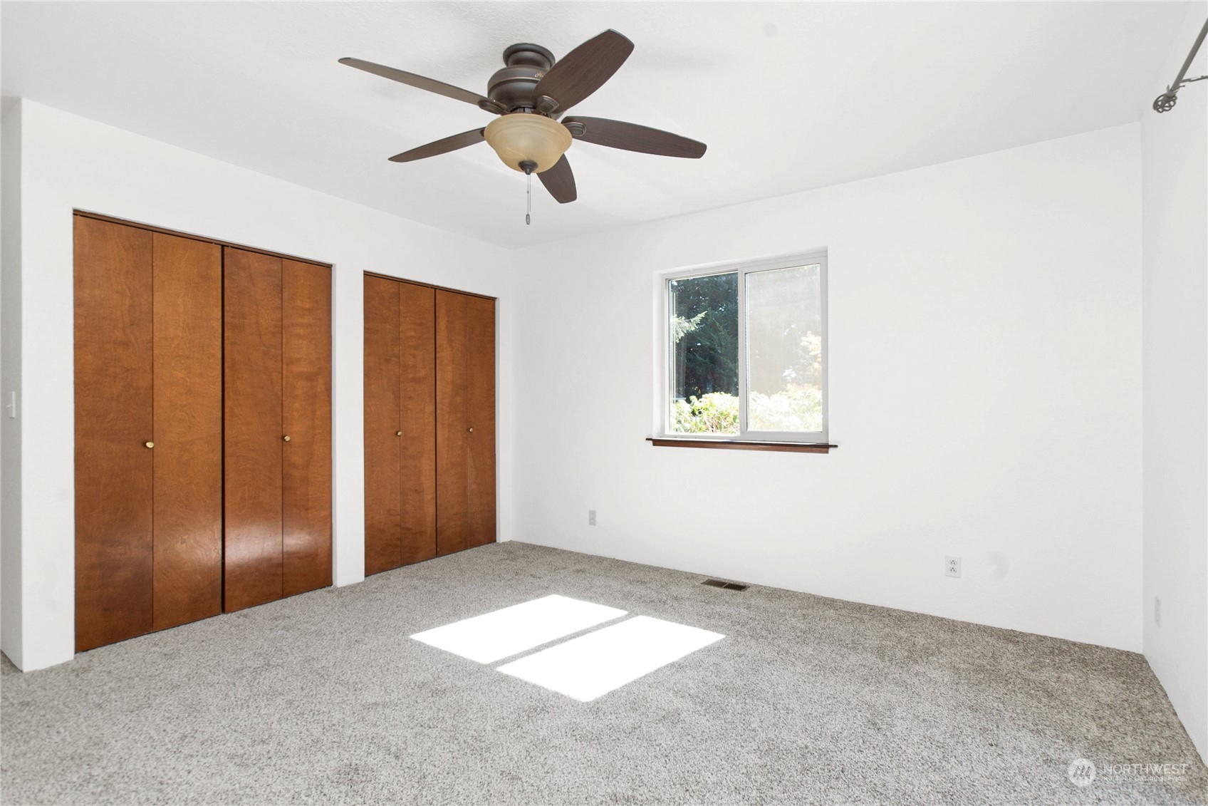 16635 Case Road Southwest Rochester, WA 98579 - Photo 25 of 35 an empty room with fan and windows