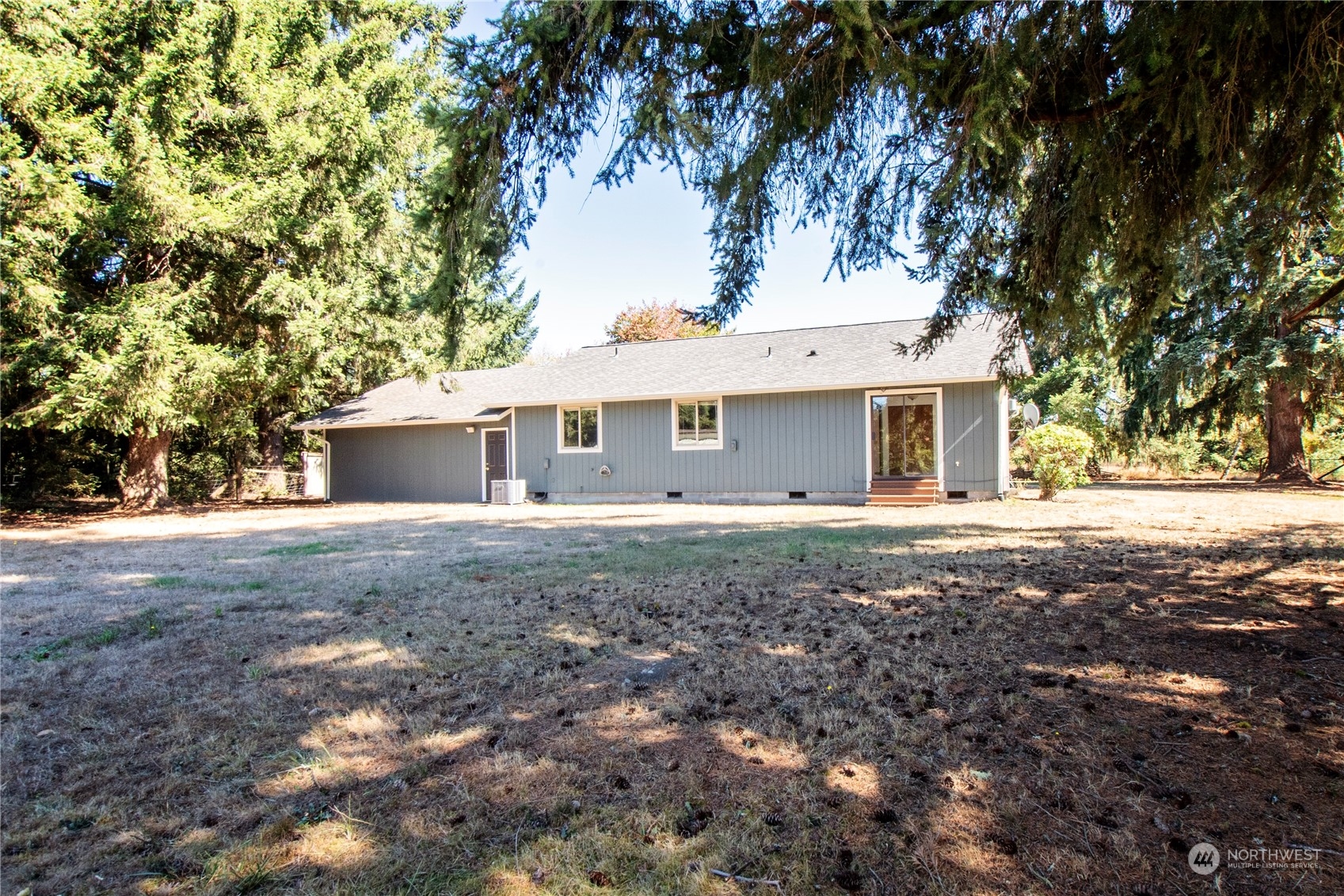 16635 Case Road Southwest Rochester, WA 98579 - Photo 27 of 35 a view of a house with a yard