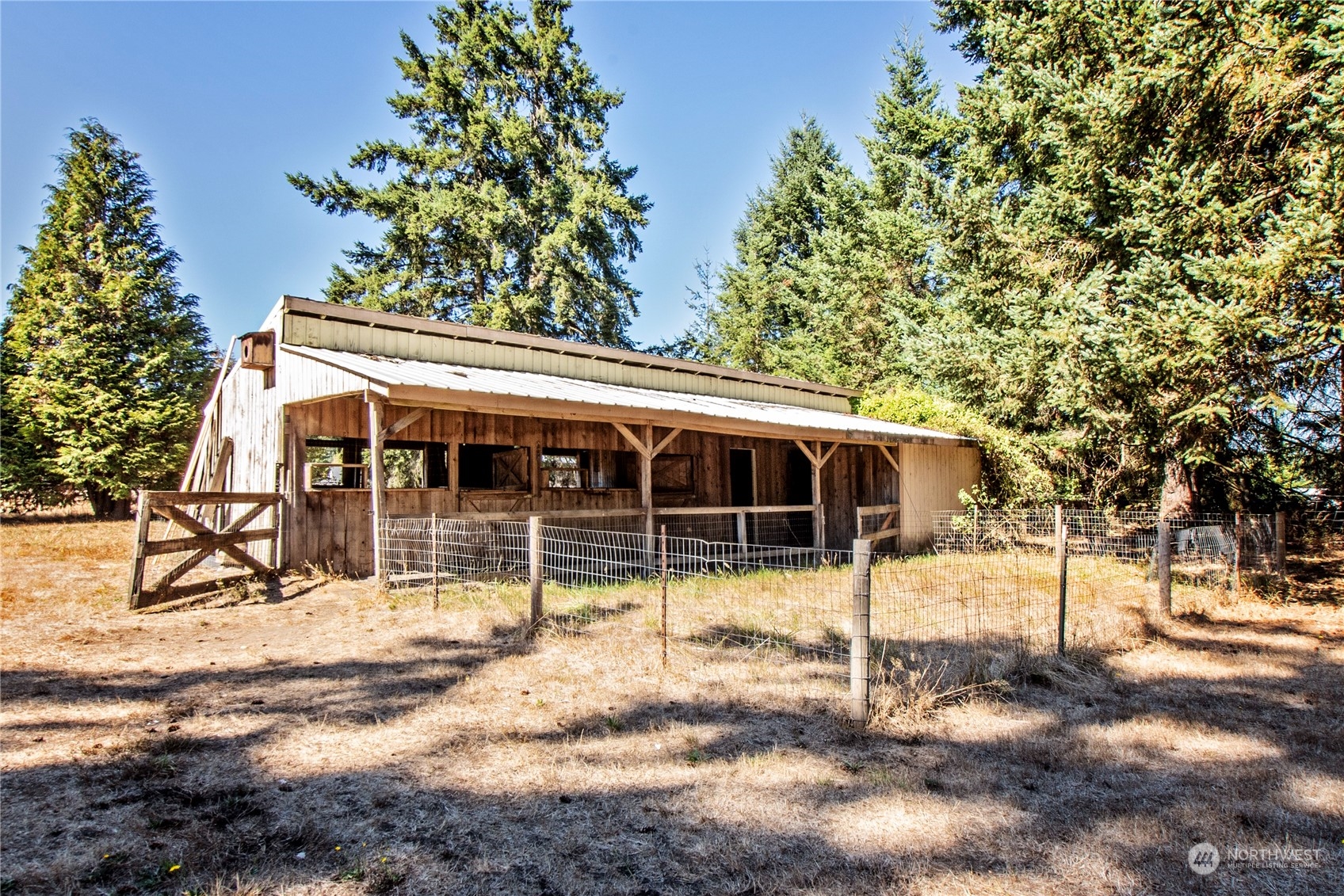 16635 Case Road Southwest Rochester, WA 98579 - Photo 31 of 35 a view of house with snow on the road