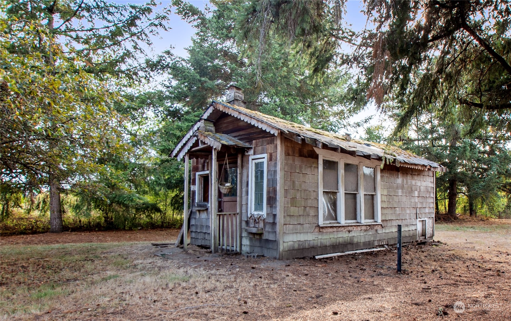 16635 Case Road Southwest Rochester, WA 98579 - Photo 34 of 35 a view of a house with a yard
