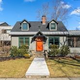 a front view of a house with swimming pool