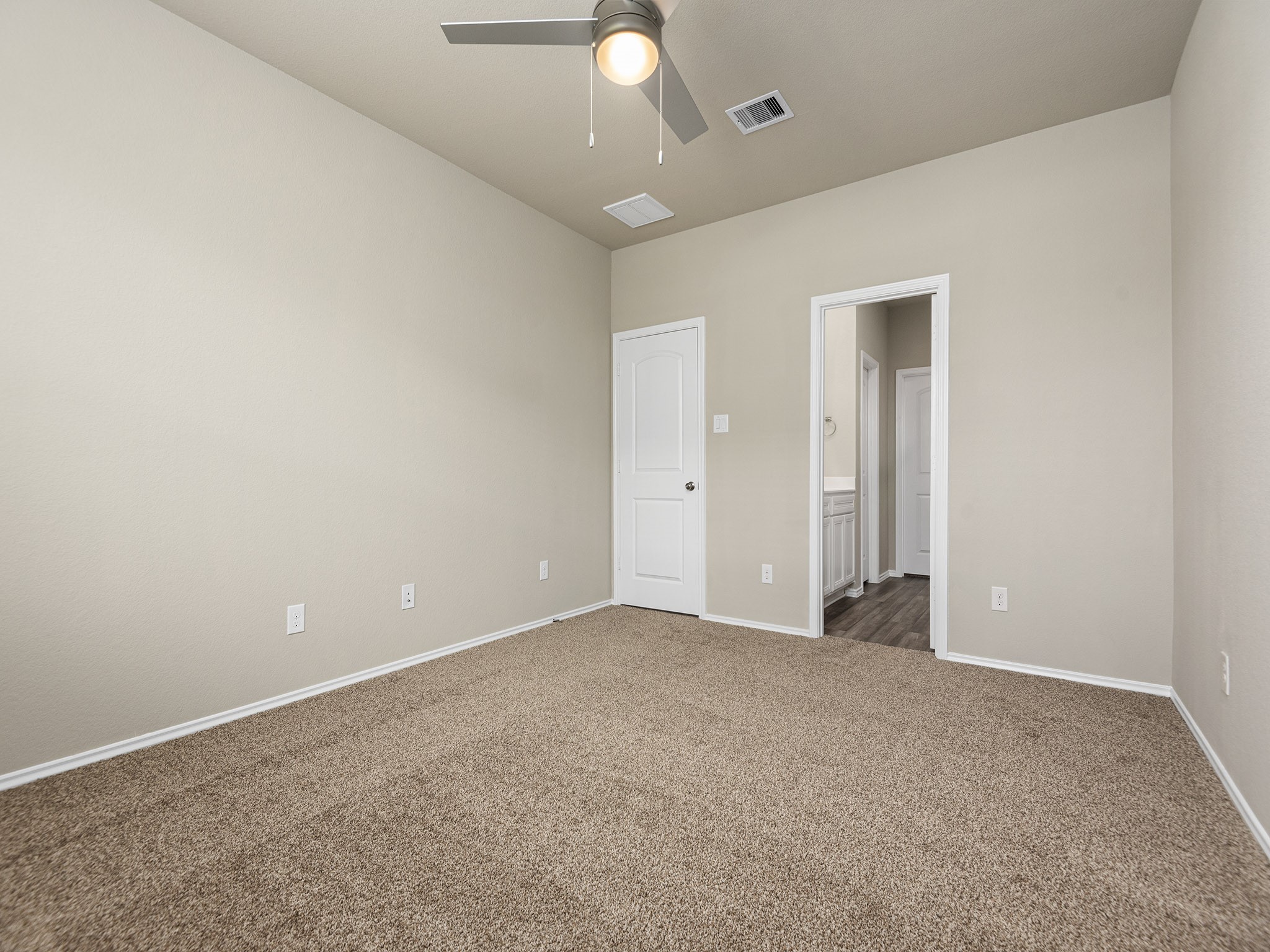 9278 Inland Leather Lane Conroe, TX 77385 - Photo 16 of 35 Primary bedroom. Carpet has been replaced with vinyl.