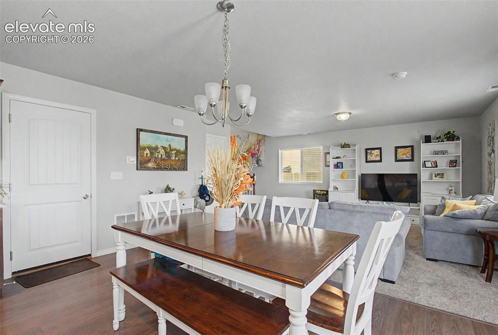 10957 Avena Road Peyton, CO 80831 - Photo 11 of 34 Spacious dining area