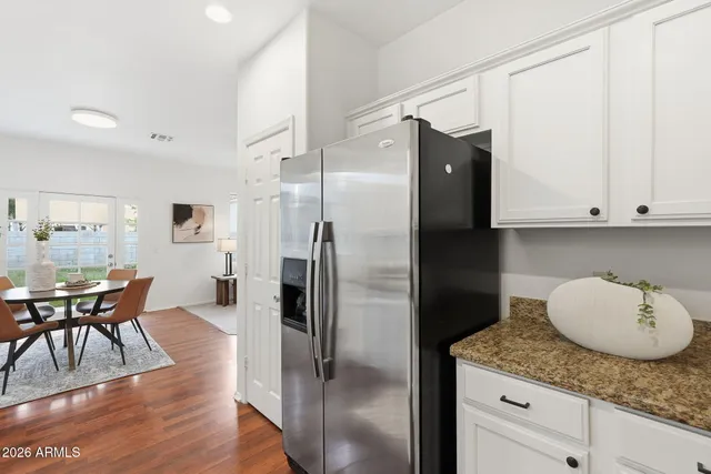 a kitchen that has a cabinets counter space and a sink
