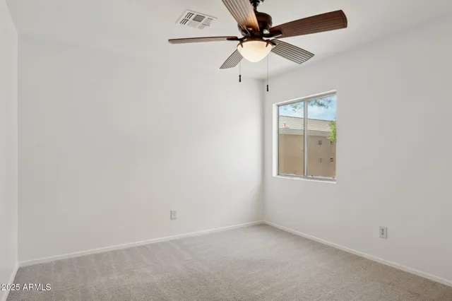 a bathroom with a sink toilet a mirror and shower