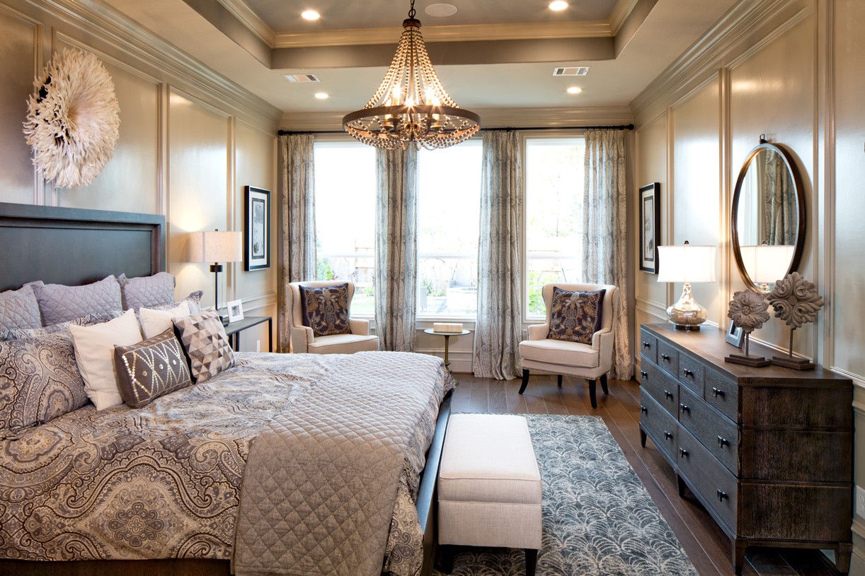 5405 Bellano Bend Leander, TX 78641 - Photo 6 of 13 a spacious bedroom with a large bed and a chandelier