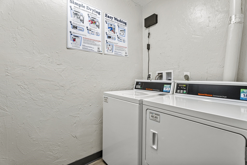 531 Main Street, Unit 403M Worcester, MA 01608 - Photo 35 of 39 a utility room with dryer and washer