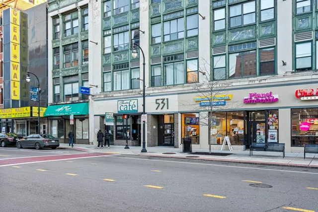 a store with outdoor seating area
