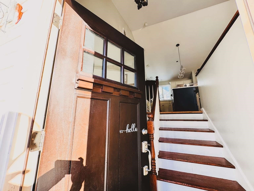 70 Brown Street Fall River, MA 02724 - Photo 2 of 31 a view of entryway and hall with wooden floor