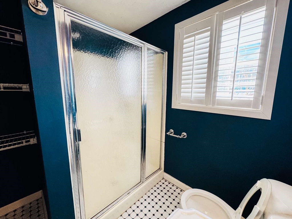 70 Brown Street Fall River, MA 02724 - Photo 27 of 31 a bathroom with a toilet and a shower