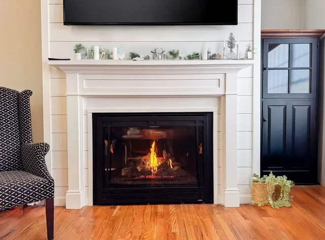 a fireplace with a sink