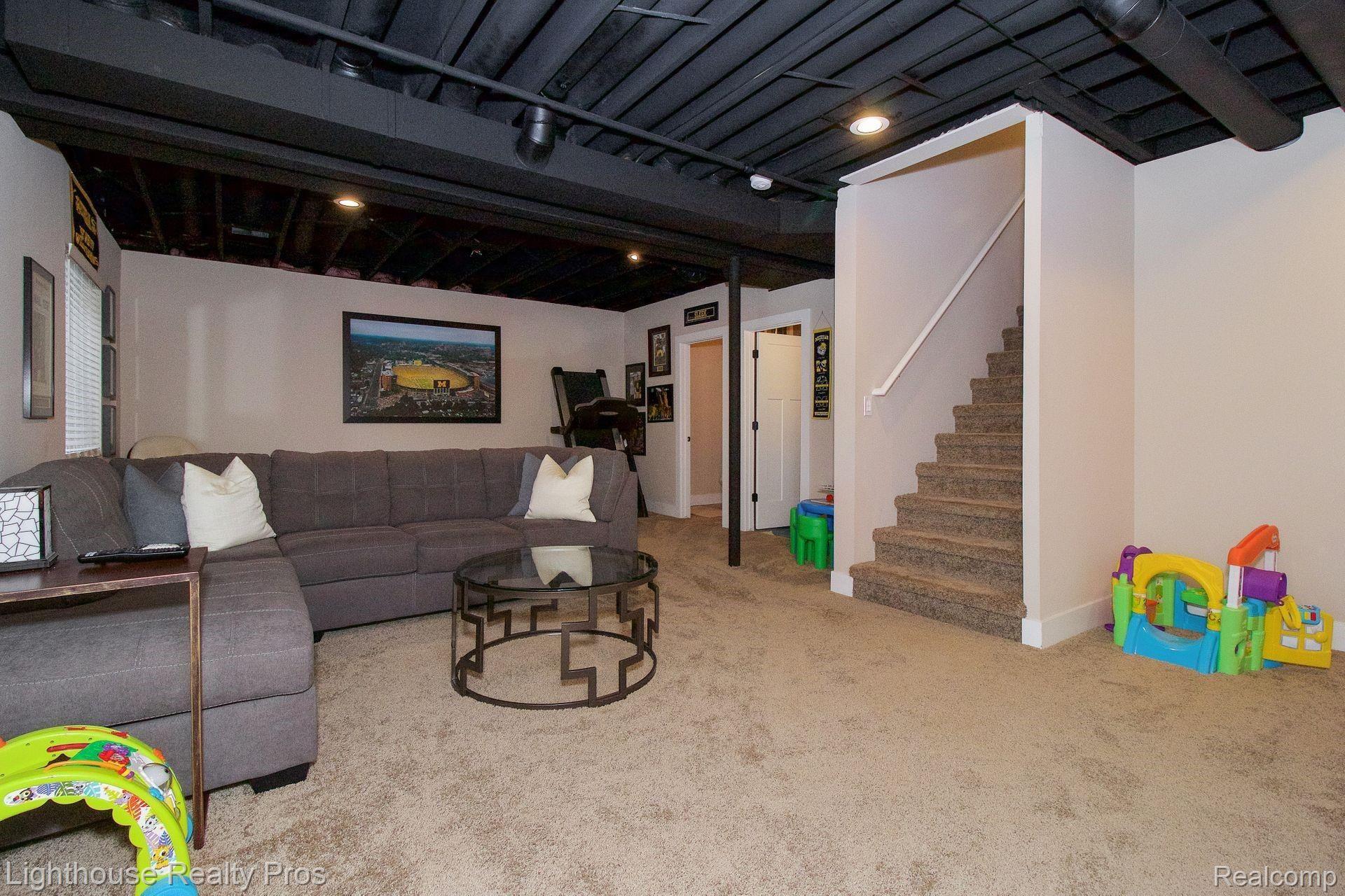 2897 Fisher Road Howell, MI 48855 - Photo 27 of 37 Finished basement for kids play room or the man cave!
