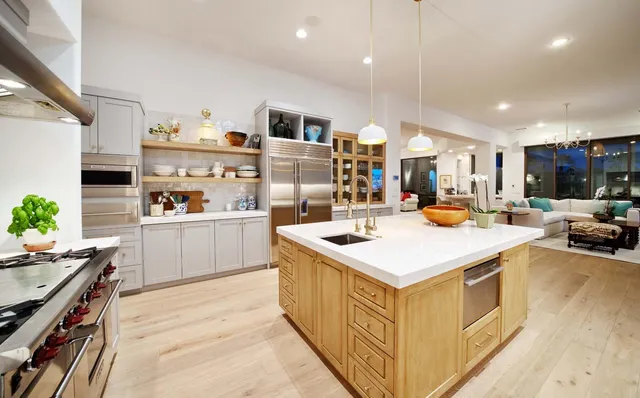 a living room with furniture and a glass door