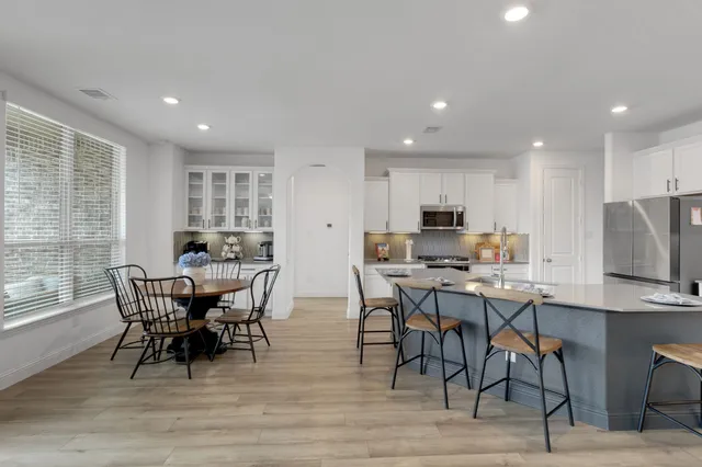 a view of a dining room with furniture