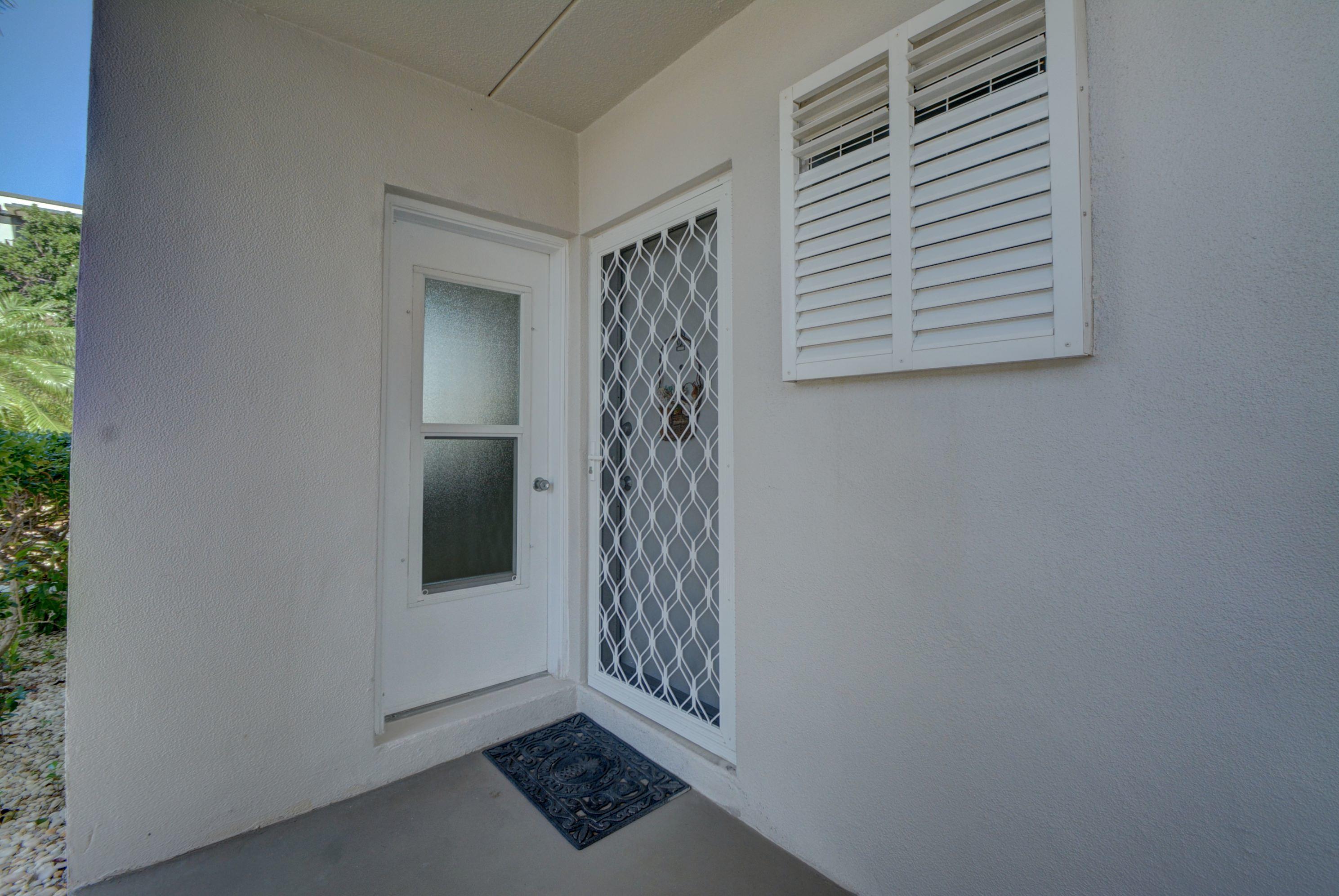2730 Banyan Road, Unit B1 Boca Raton, FL 33432 - Photo 21 of 35 Front and Kitchen Doors