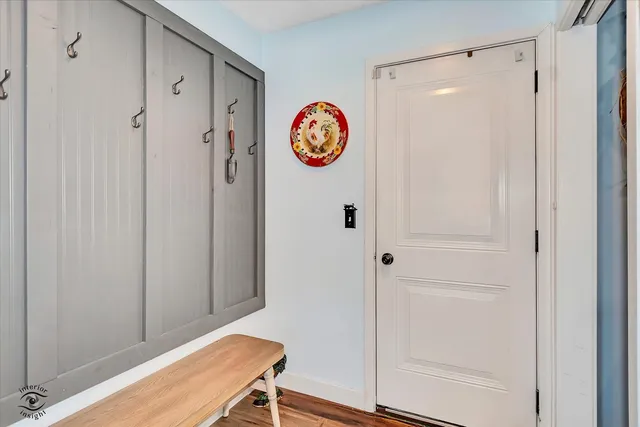 a bathroom with a cabinet and a shower