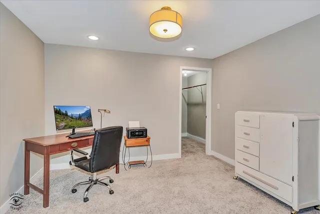 a view of a workspace with furniture