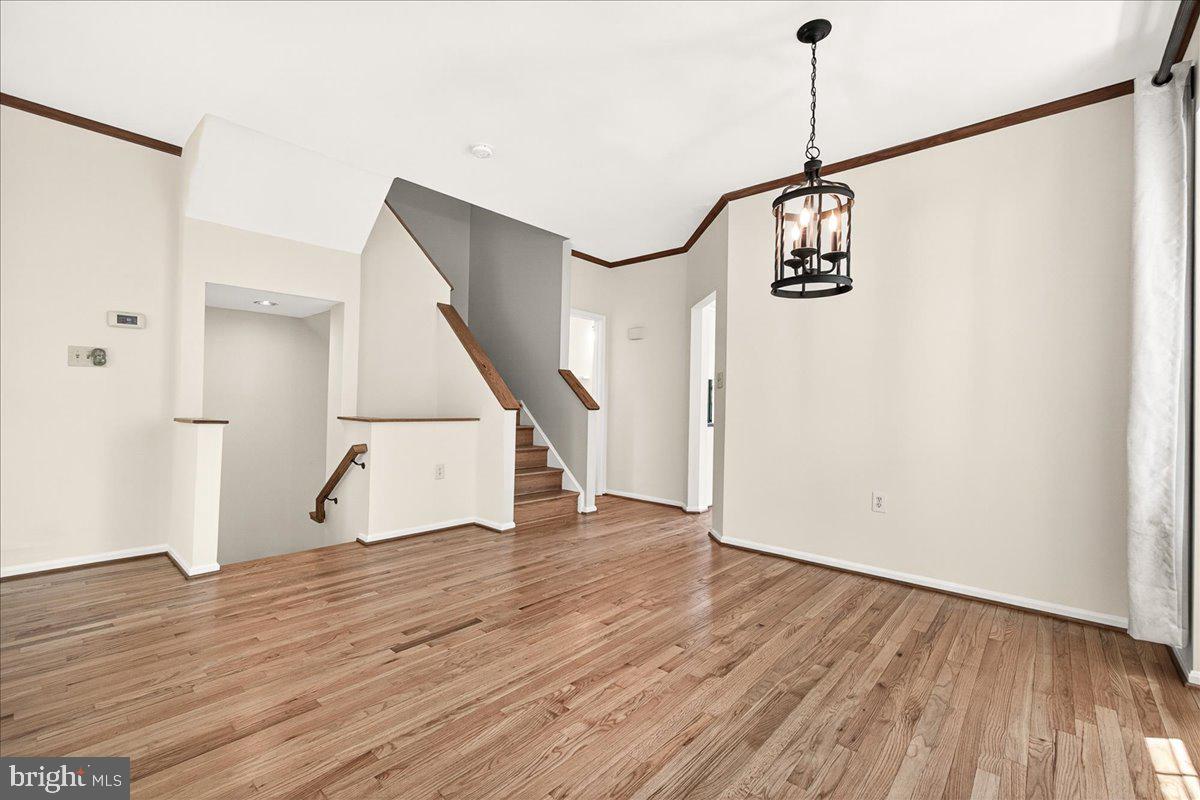 111 Water Land Way Frederick, MD 21702 - Photo 11 of 35 a view of an entryway with wooden floor