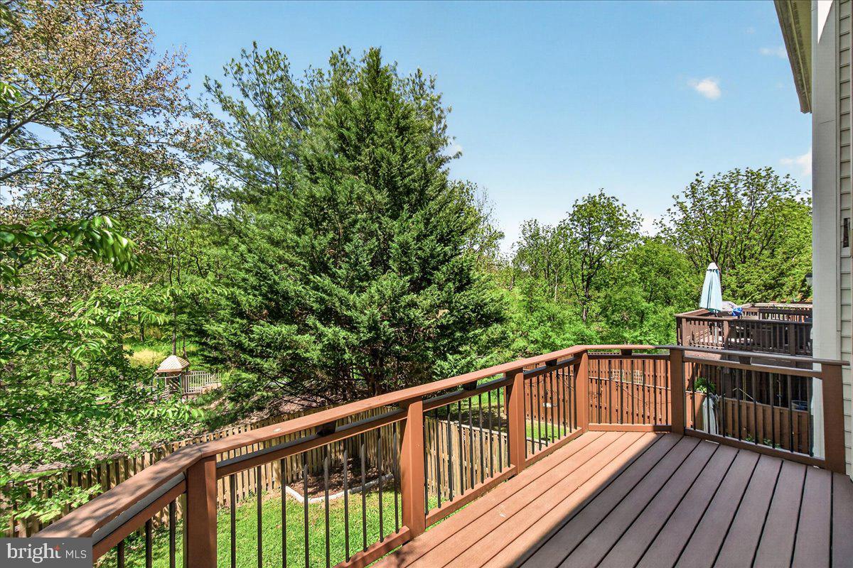 111 Water Land Way Frederick, MD 21702 - Photo 15 of 35 a view of balcony with wooden floor and fence