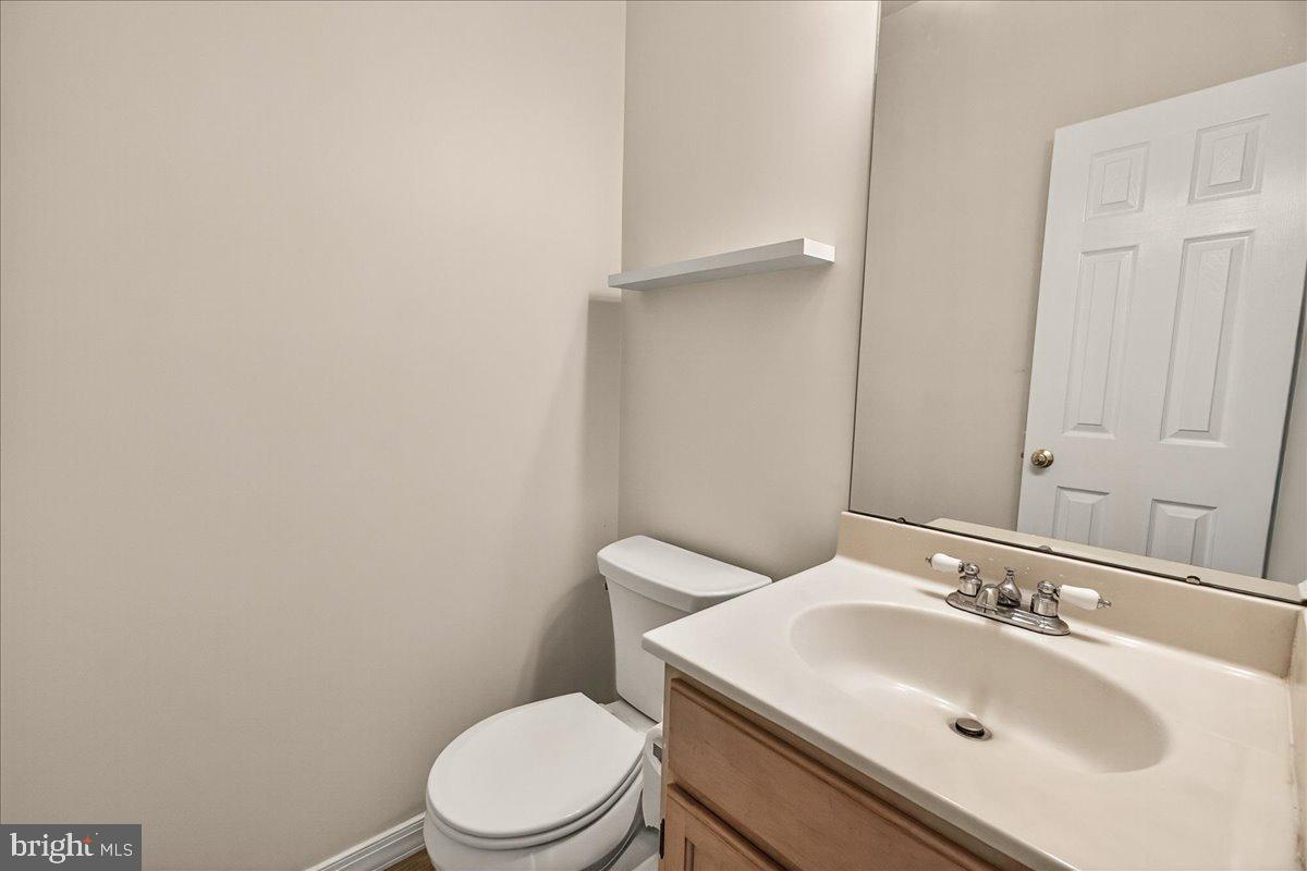111 Water Land Way Frederick, MD 21702 - Photo 17 of 35 a bathroom with a sink toilet and mirror