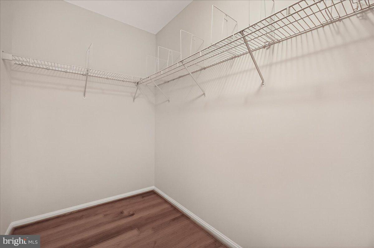 111 Water Land Way Frederick, MD 21702 - Photo 27 of 35 a view of a room with racks on the wall