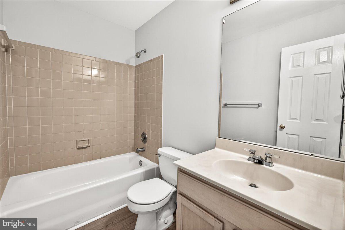 111 Water Land Way Frederick, MD 21702 - Photo 32 of 35 a bathroom with a sink a toilet and a bathtub