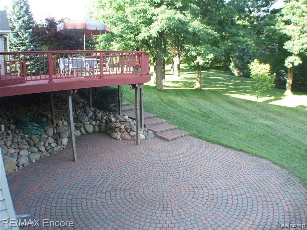 8550 Allen Road Clarkston, MI 48348 - Photo 21 of 26 Custom brick paver patio off LL